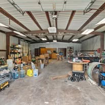 Penner Construction workshop and equipment in Carthage TX